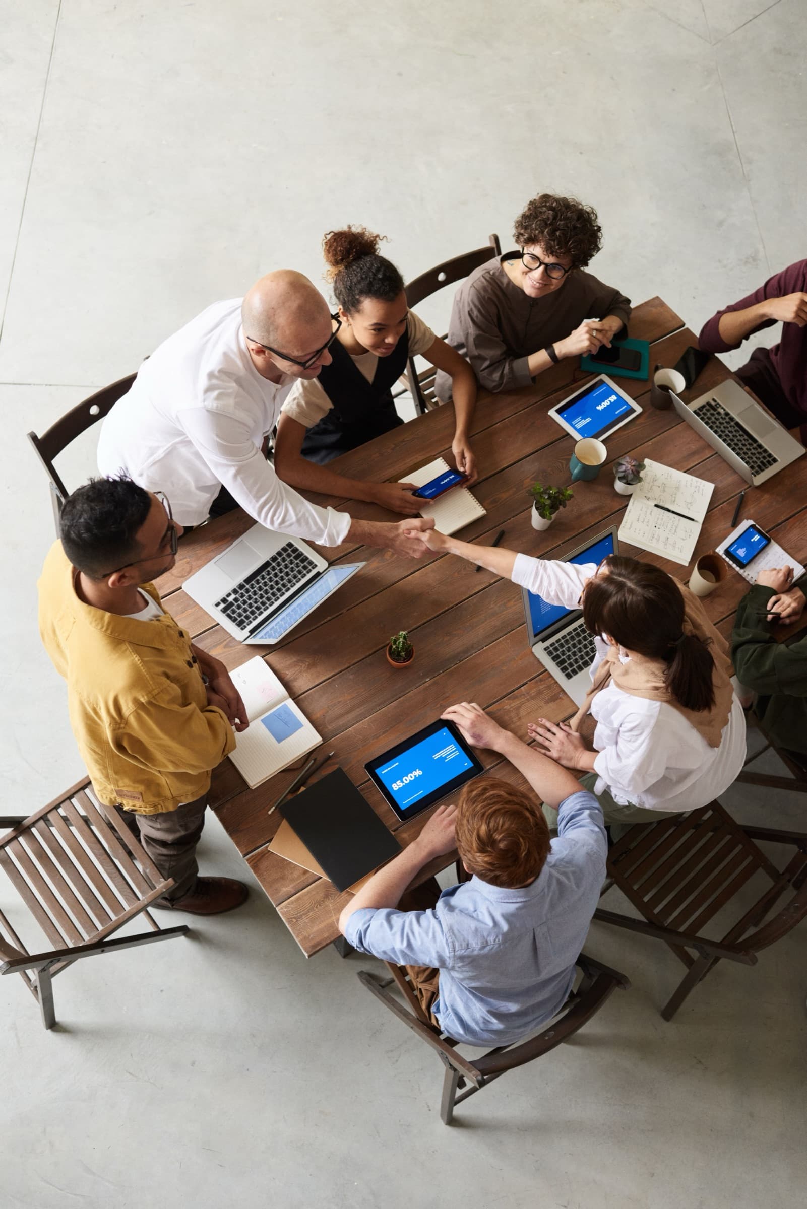 A team working around one table, seen from above